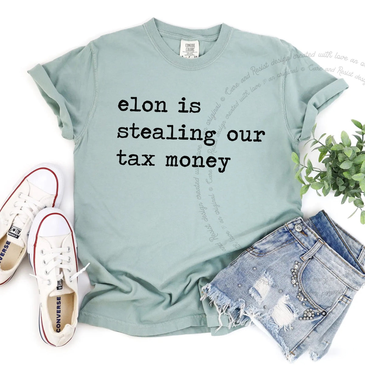 Elon Is Stealing Our Tax Money Care & Resist progressive t-shirt in Bay
