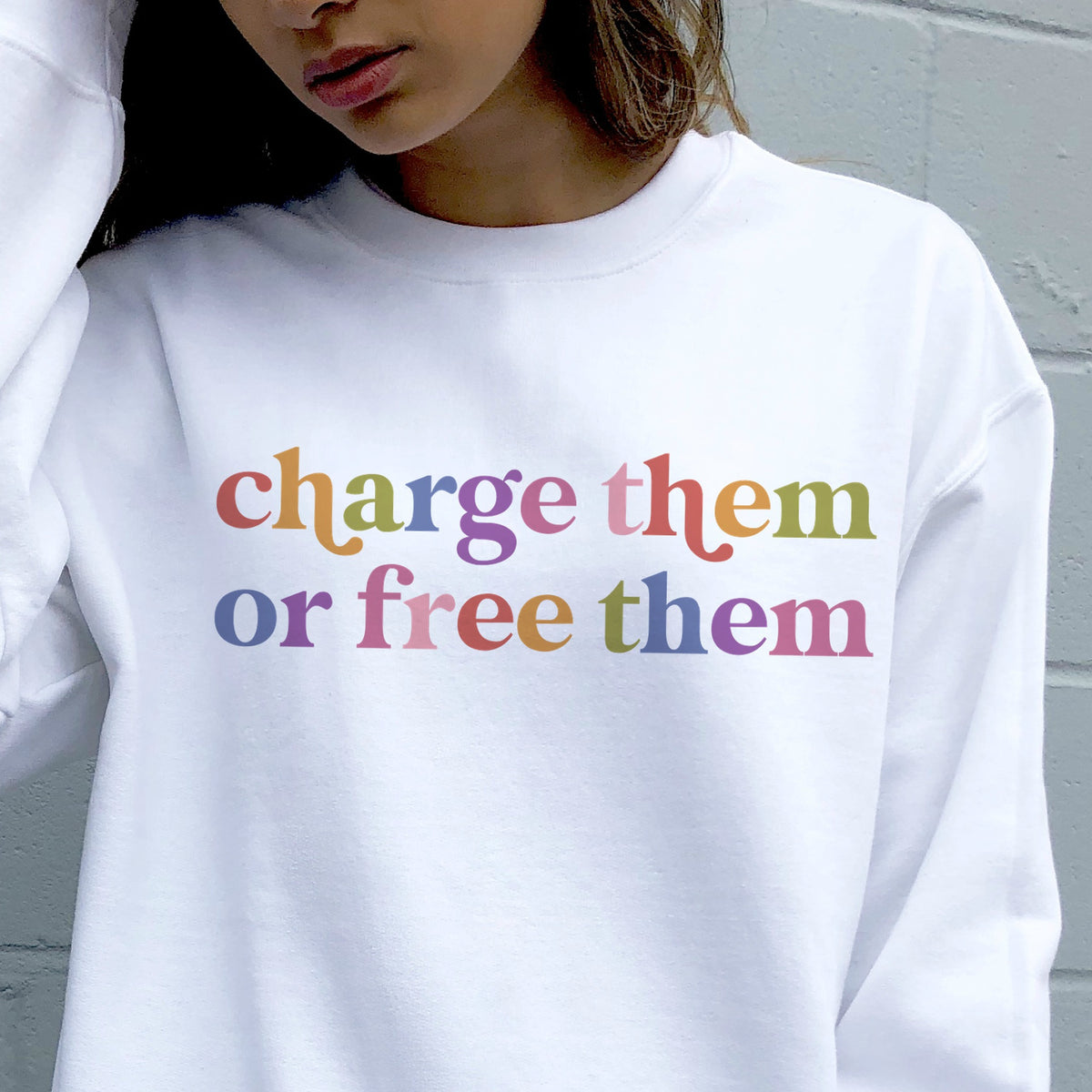 Charge Them or Free Them Care & Resist Gildan crewneck sweatshirt in White