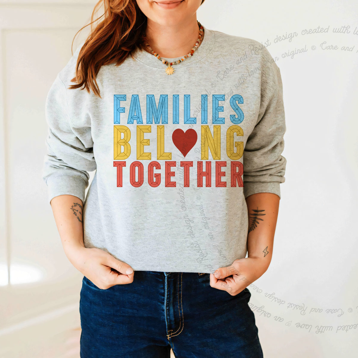 Families Belong Together Care & Resist Gildan crewneck sweatshirt in Sport Grey