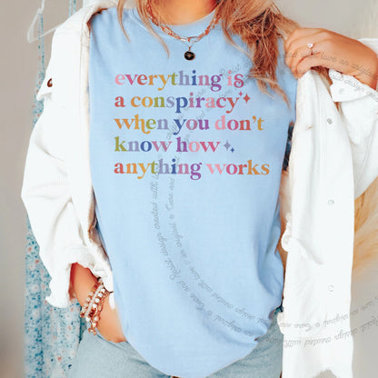 Everything Is a Conspiracy When You Don't Know How Anything Works Care & Resist progressive t-shirt in Chambray