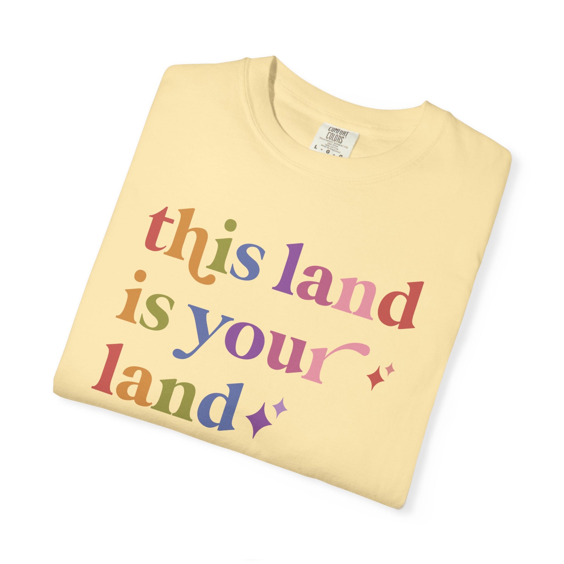 This Land is Your Land Care & Resist rainbow Comfort Colors tee