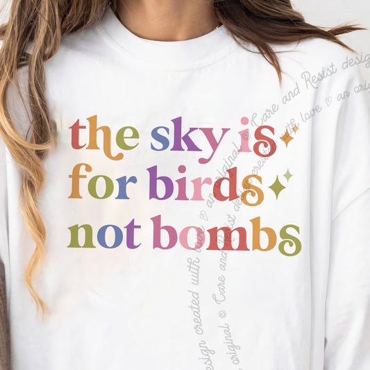 The Sky is for Birds not Bombs Care & Resist progressive t-shirt in White