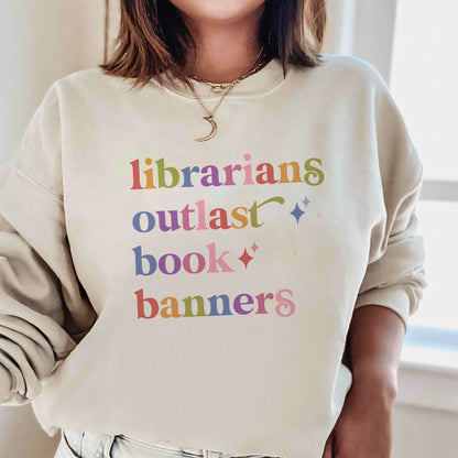 Librarians Outlast Book Banners Care & Resist Gildan crewneck sweatshirt in Sand