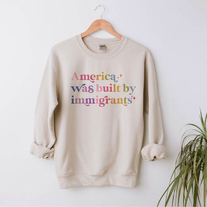 America Was Built By Immigrants Care & Resist Gildan crewneck sweatshirt in Sand