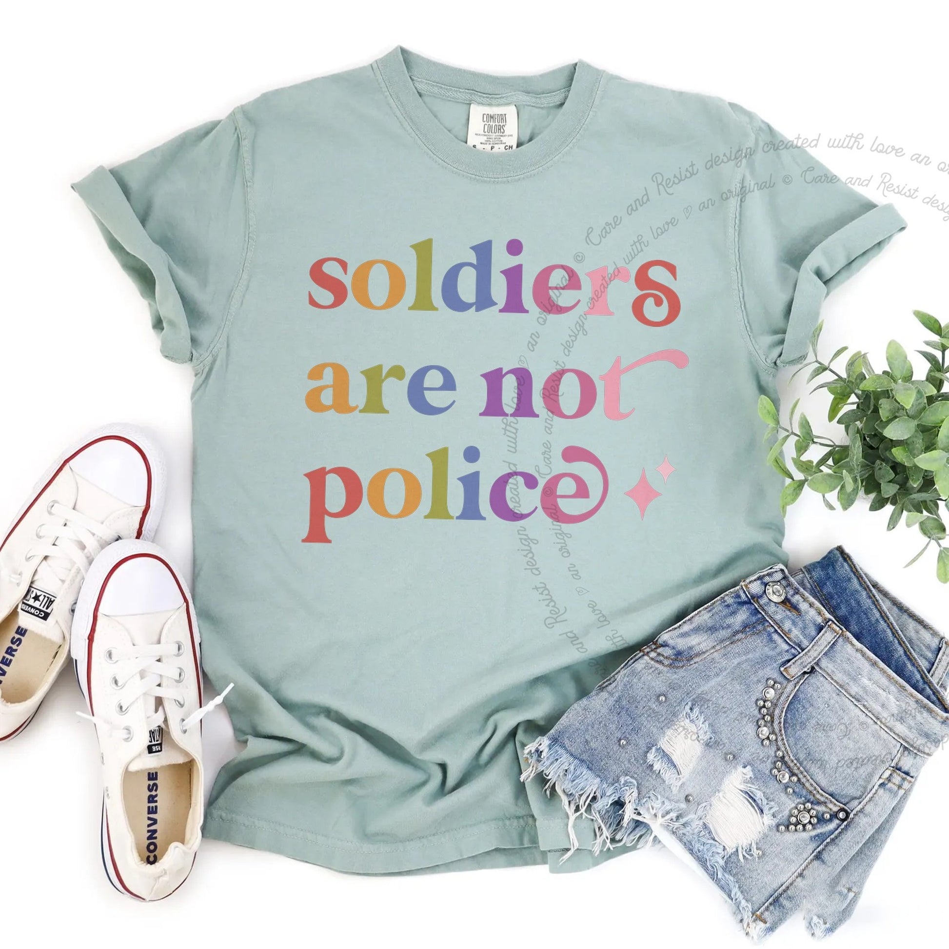 Soldiers are not Police Care & Resist rainbow Comfort Colors tee, Bay