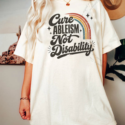 Cure Ableism not Disability Badge Care & Resist progressive t-shirt in Ivory