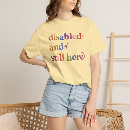 Disabled and Still Here Care & Resist rainbow Comfort Colors tee