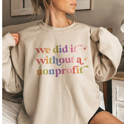 We Did It Without a Nonprofit Care & Resist Gildan crewneck sweatshirt in Sand