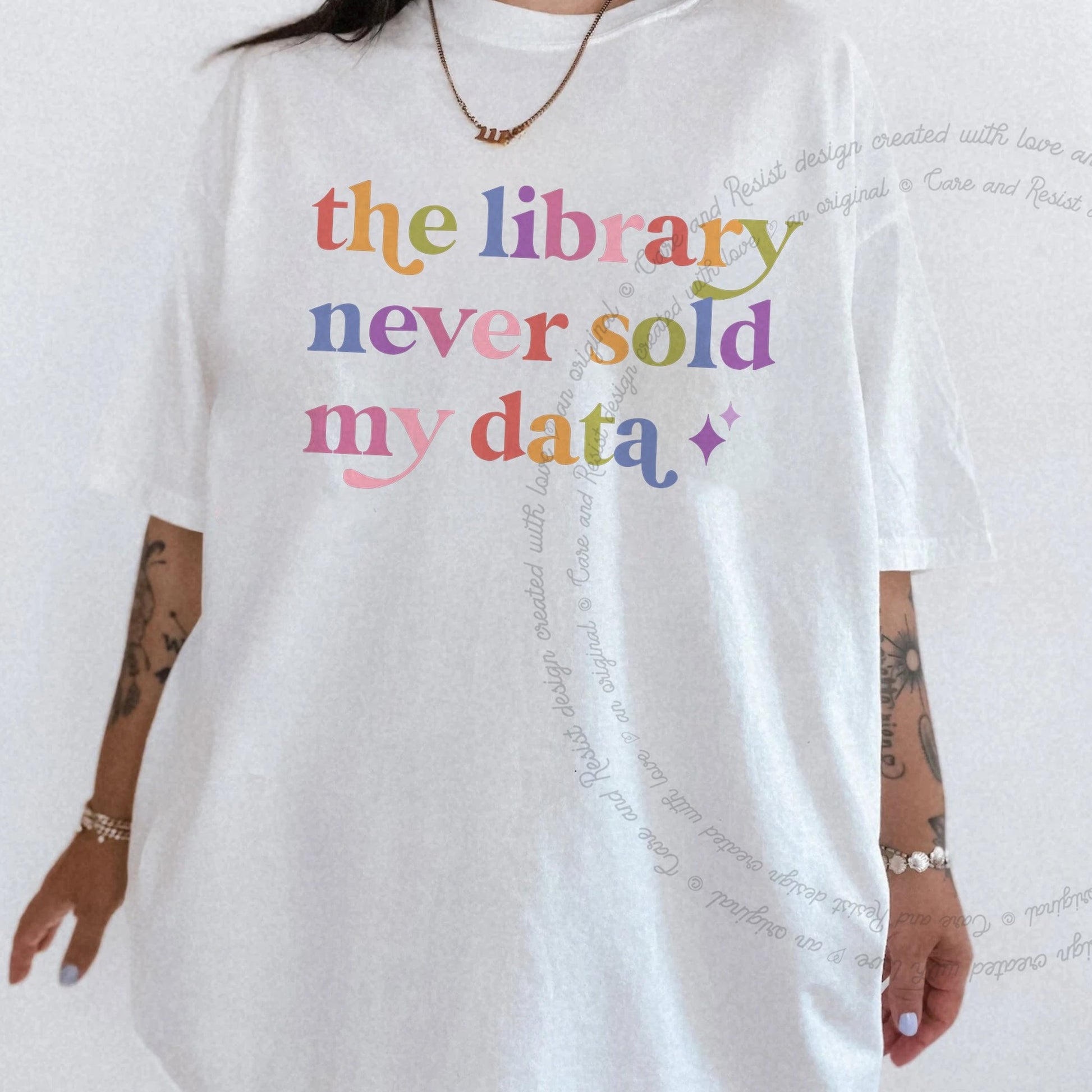 The Library Never Sold My Data Care & Resist rainbow Comfort Colors tee, White