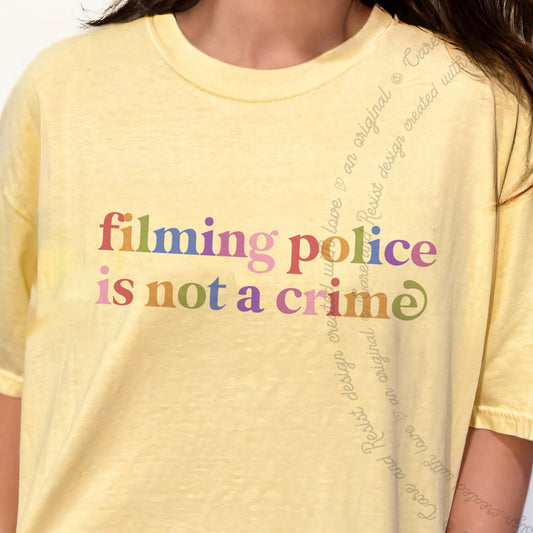 Filming Police is not a Crime Care & Resist progressive t-shirt in Banana