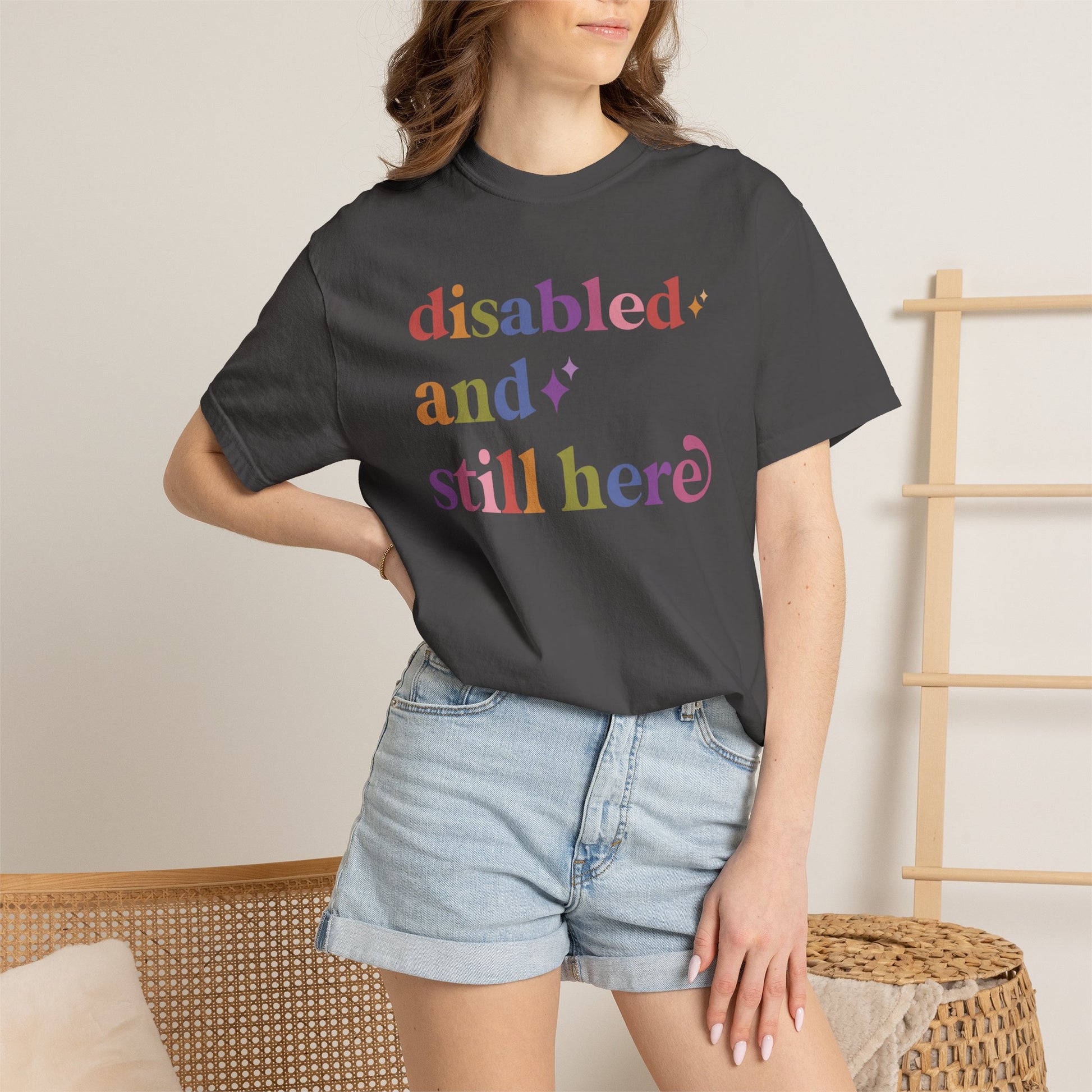 Disabled and Still Here Care & Resist rainbow Comfort Colors tee