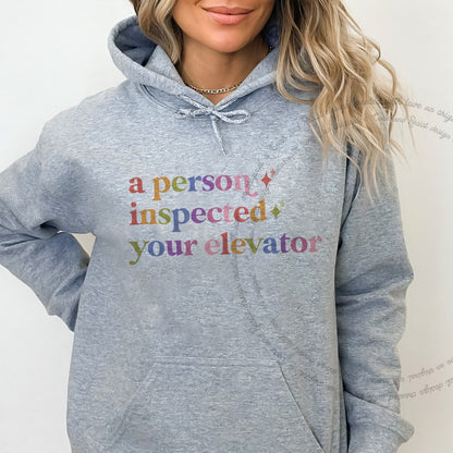 A Person Inspected Your Elevator Care & Resist Gildan hoodie in Sport Grey