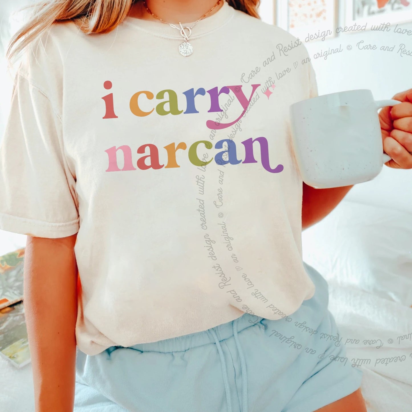 I Carry Narcan Care & Resist rainbow tee