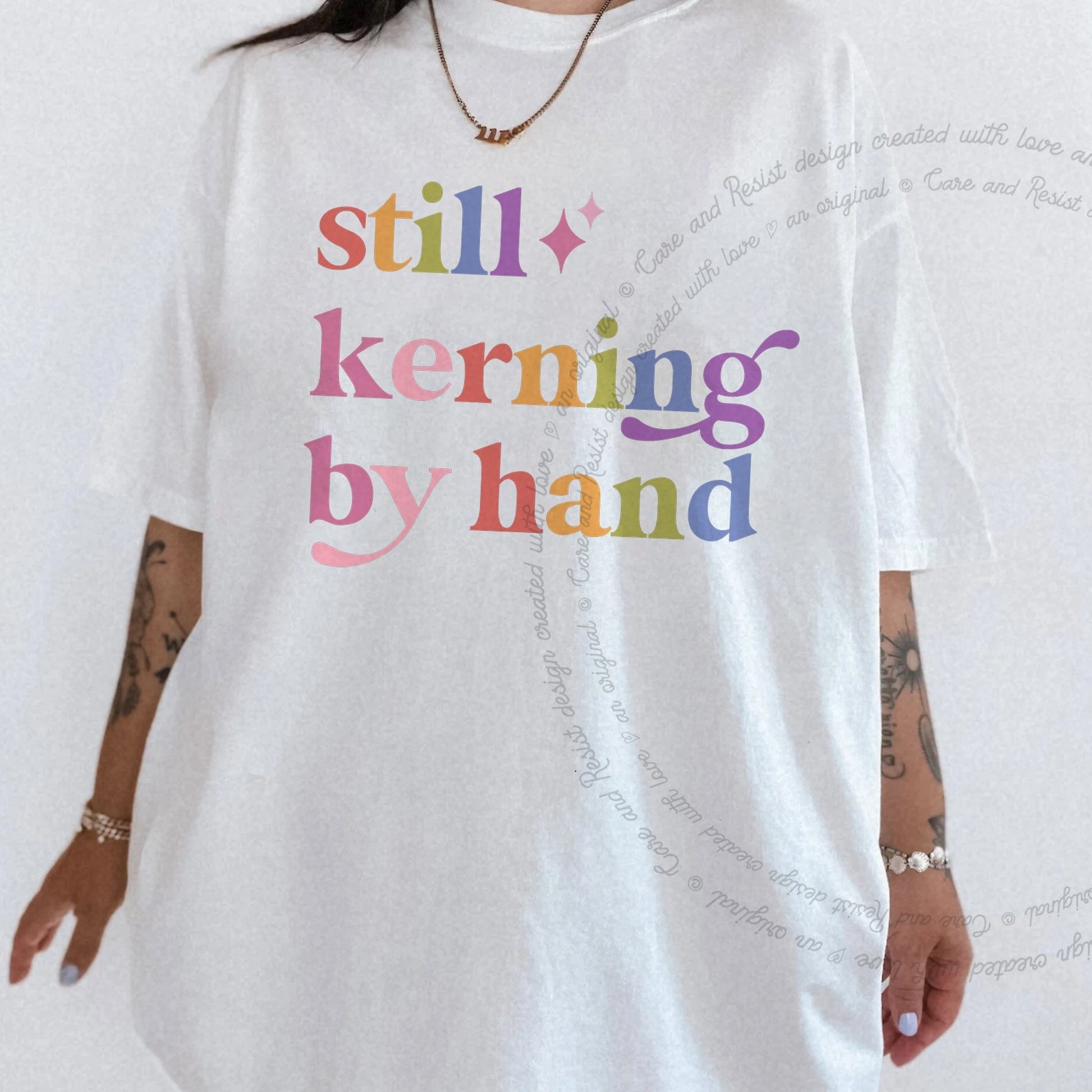 Still Kerning By Hand Care & Resist rainbow Comfort Colors tee, White