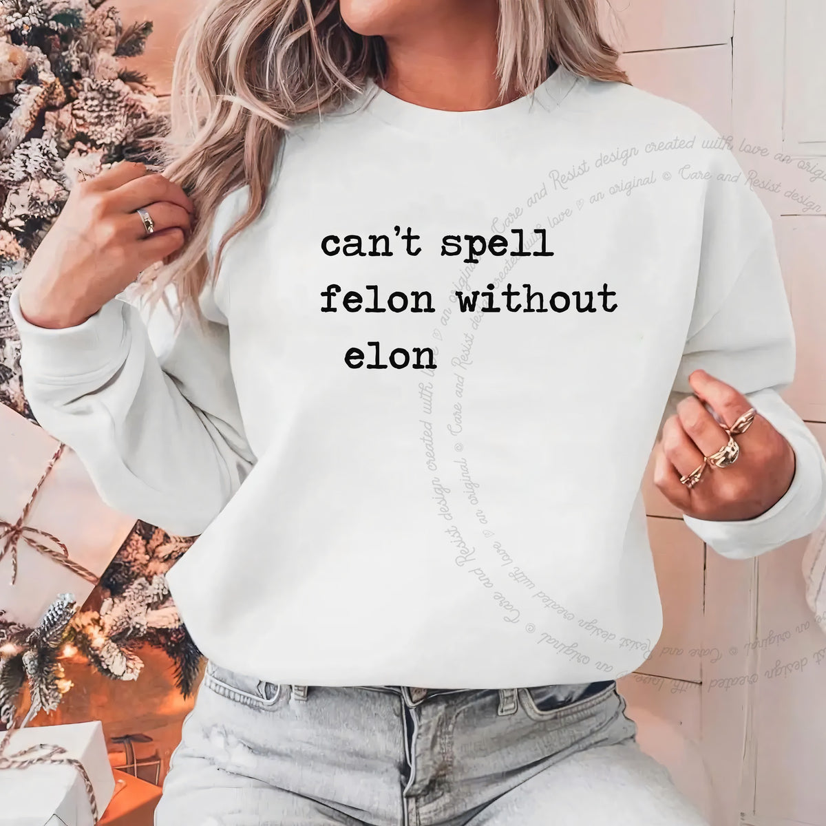 Can't Spell Felon Without Elon Care & Resist Gildan crewneck sweatshirt in White