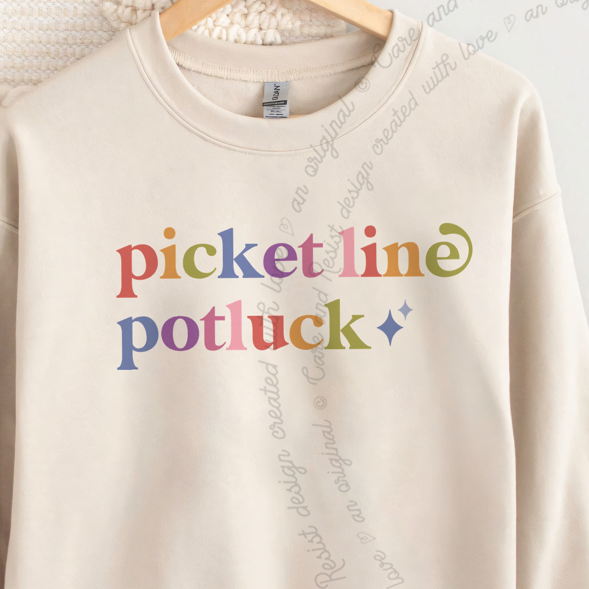 Picket Line Potluck Care & Resist Gildan crewneck sweatshirt in Sand