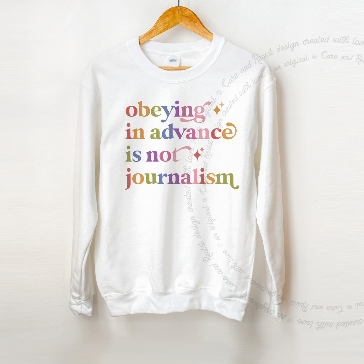 Obeying in Advance is not Journalism Care & Resist Gildan crewneck sweatshirt in White
