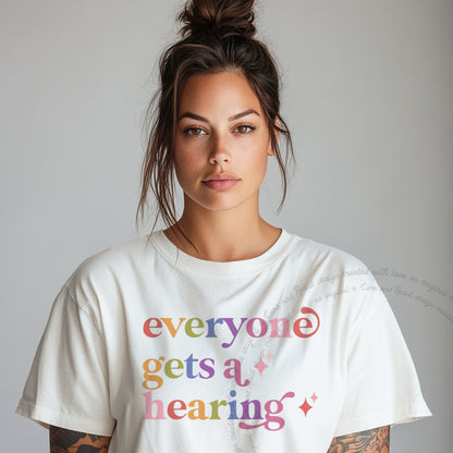Everyone Gets a Hearing Care & Resist rainbow tee