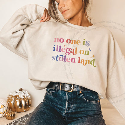 No One Is Illegal on Stolen Land Care & Resist Gildan crewneck sweatshirt in Sand