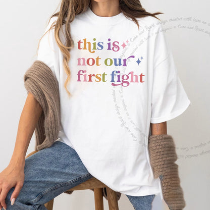 This is not Our First Fight Care & Resist rainbow tee