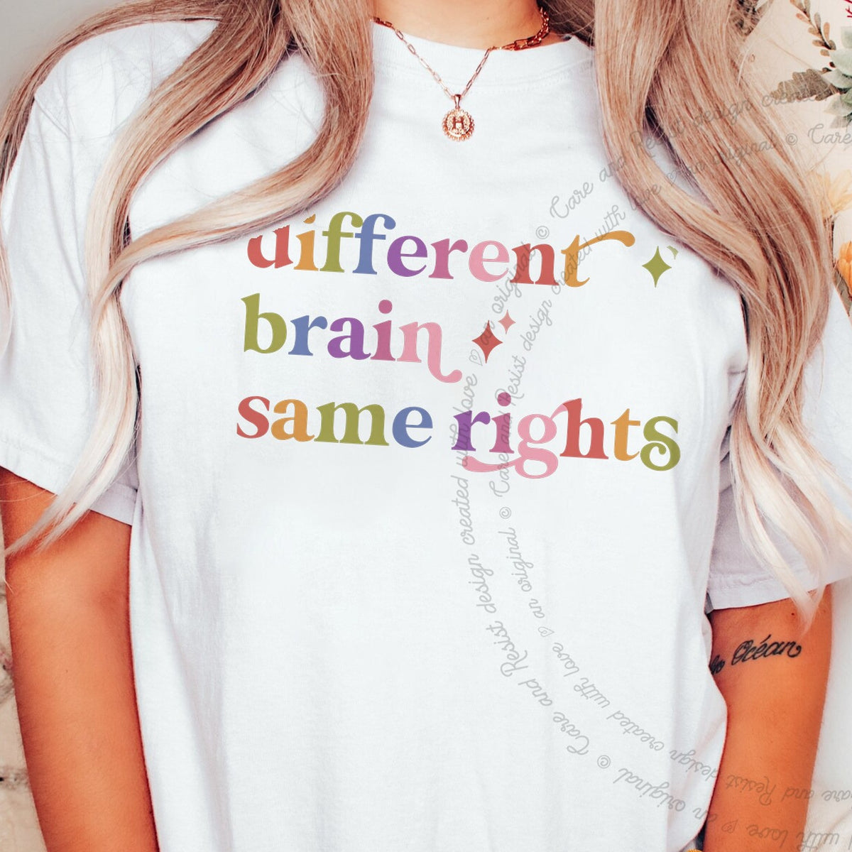 Different Brain Same Rights Care & Resist rainbow tee