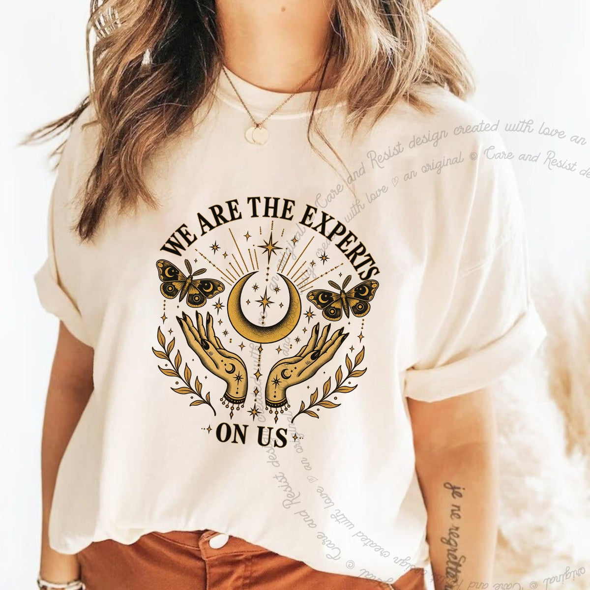 We are the Experts on Us Celestial Care & Resist progressive t-shirt in Ivory