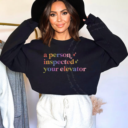 A Person Inspected Your Elevator Care & Resist Gildan crewneck sweatshirt in Black
