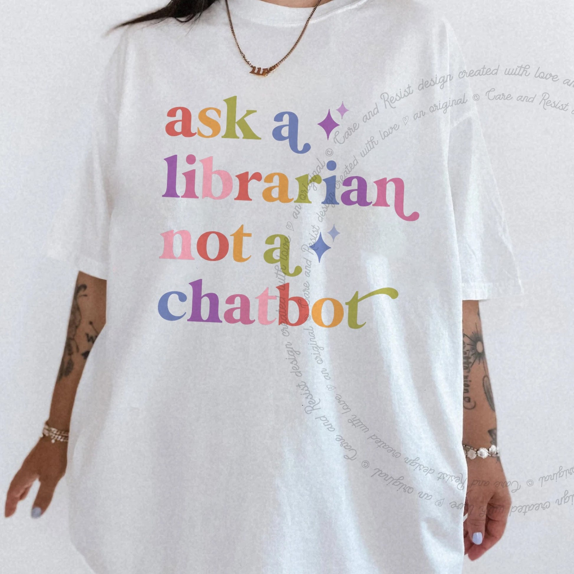 Ask a Librarian not a Chatbot Care & Resist rainbow Comfort Colors tee, White