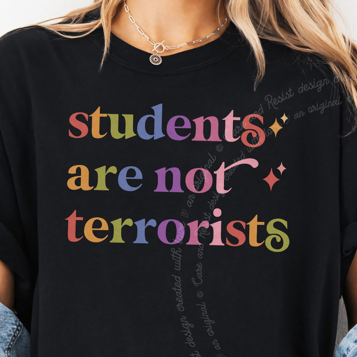 Students are not Terrorists Care & Resist tee in Black, close-up of the lettering