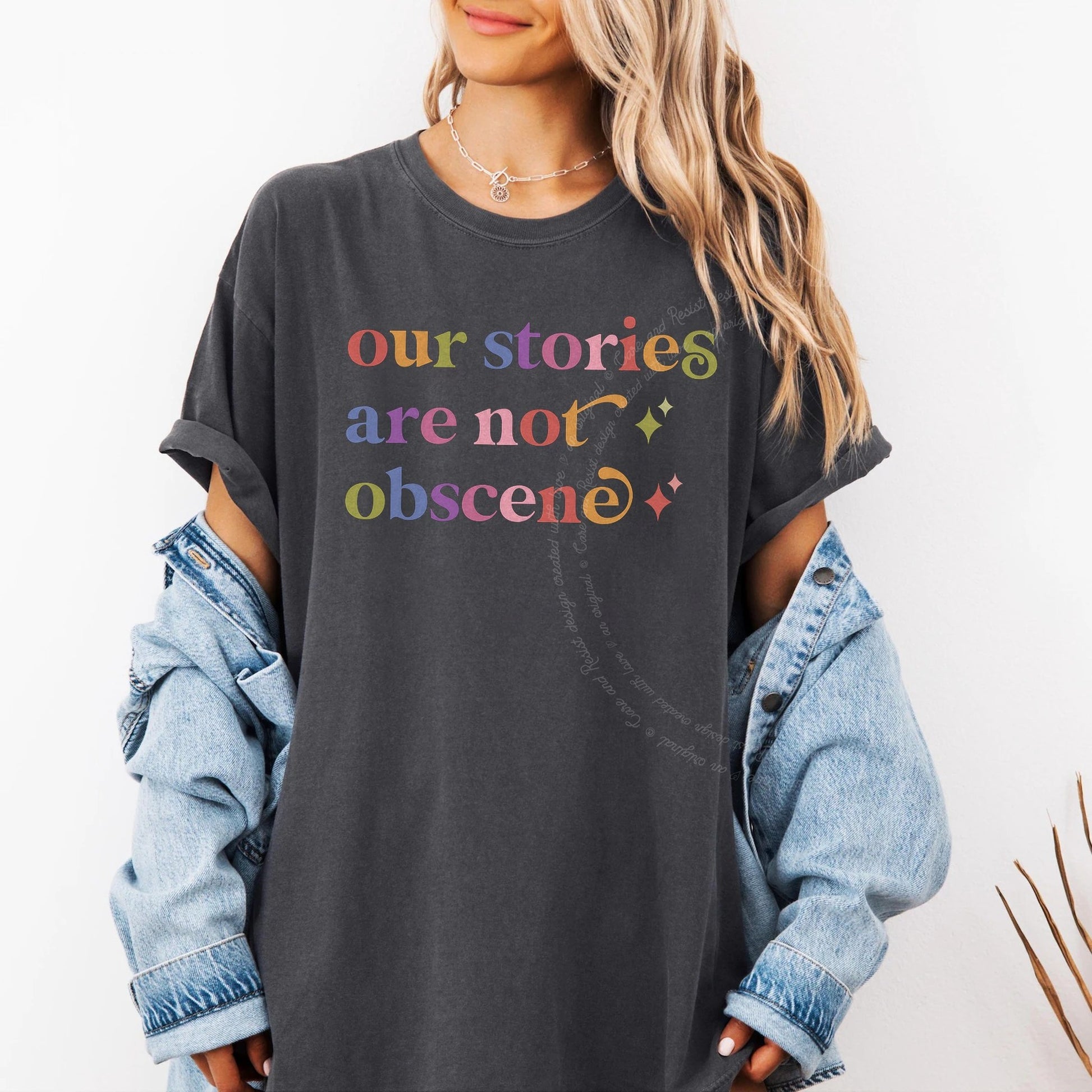 Our Stories are not Obscene Care & Resist rainbow Comfort Colors tee, Graphite