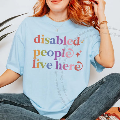 Disabled People Live Here Care & Resist rainbow tee