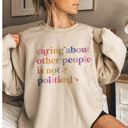 Caring About Other People Is Not Political Care & Resist Gildan crewneck sweatshirt in Sand
