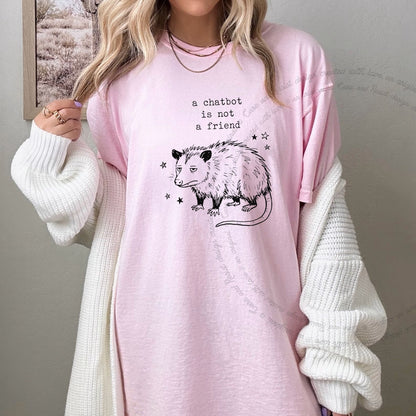 A Chatbot is not a Friend Possum Care & Resist progressive t-shirt in Blossom