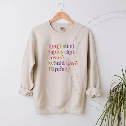Don't Sit At Tables That Jesus Would Have Flipped Care & Resist Gildan crewneck sweatshirt in Sand