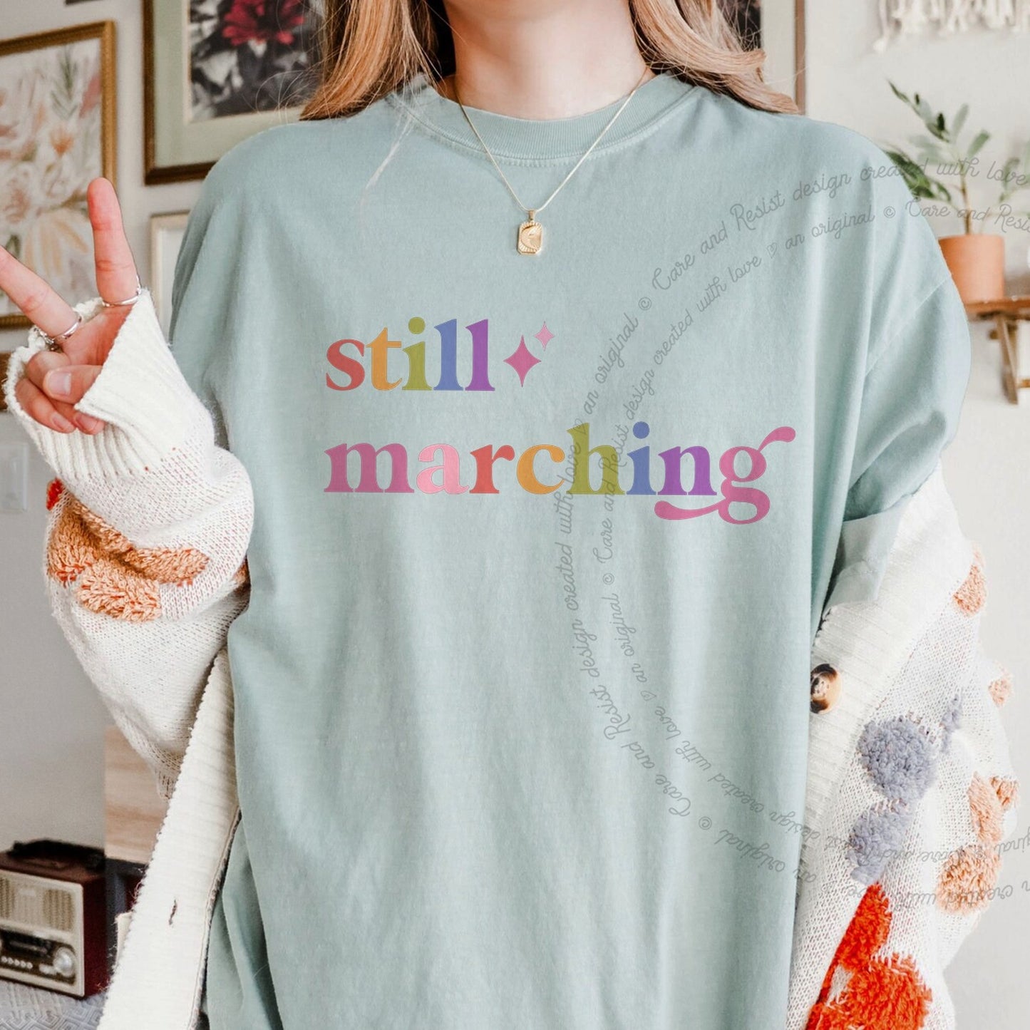 Still Marching Care & Resist rainbow tee