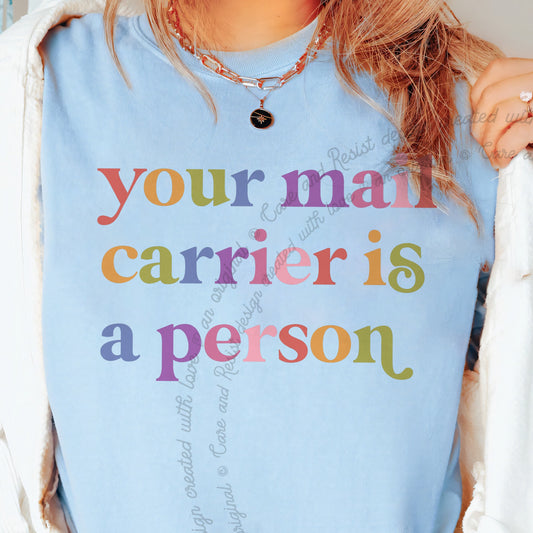 Your Mail Carrier is a Person Care & Resist tee in Chambray, close-up of the lettering