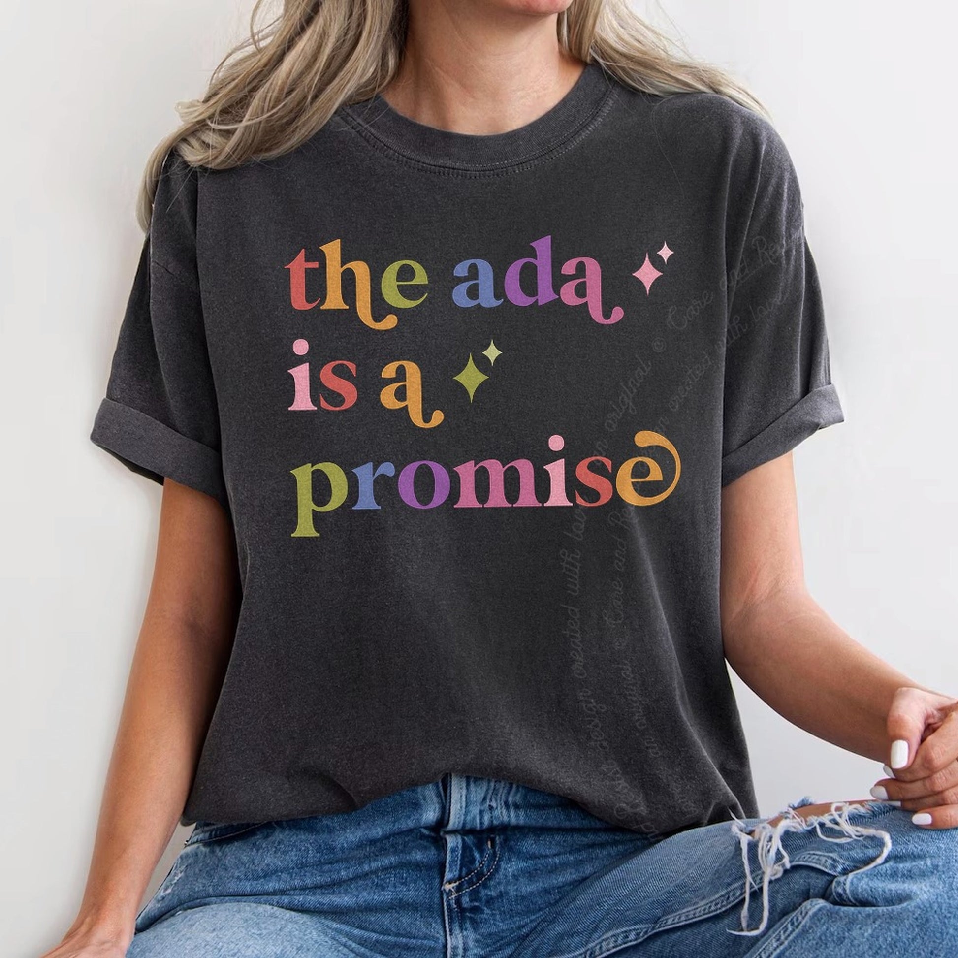 The Ada is a Promise Care & Resist rainbow tee