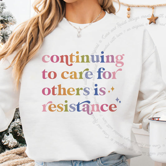 Continuing to Care for Others Is Resistance Care & Resist Gildan crewneck sweatshirt in White