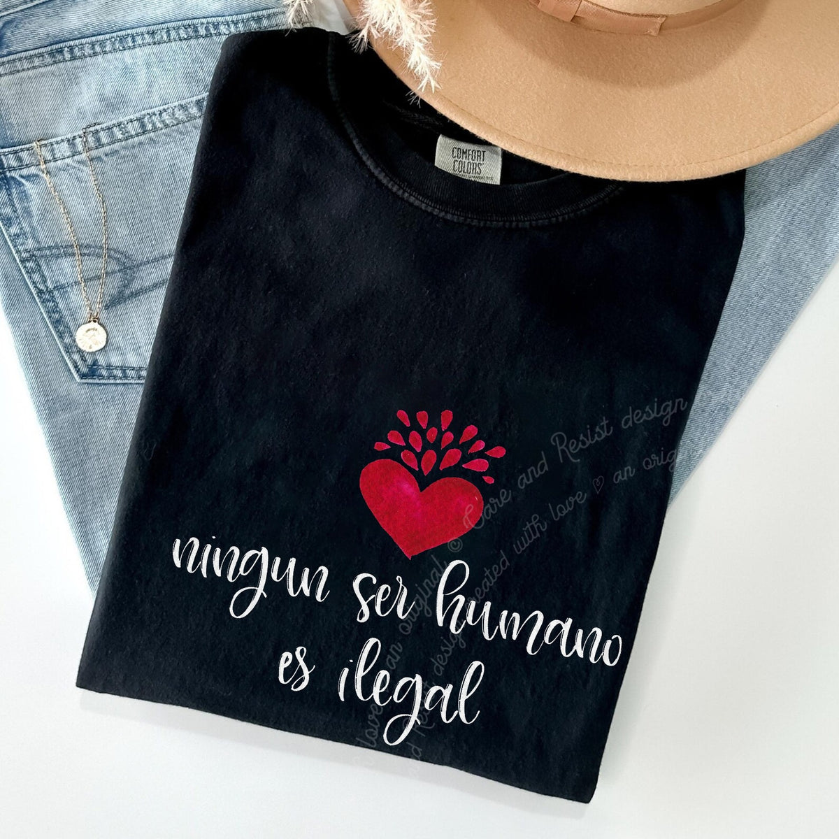 Ningun Ser Humano Es Ilegal Care & Resist progressive t-shirt in Black