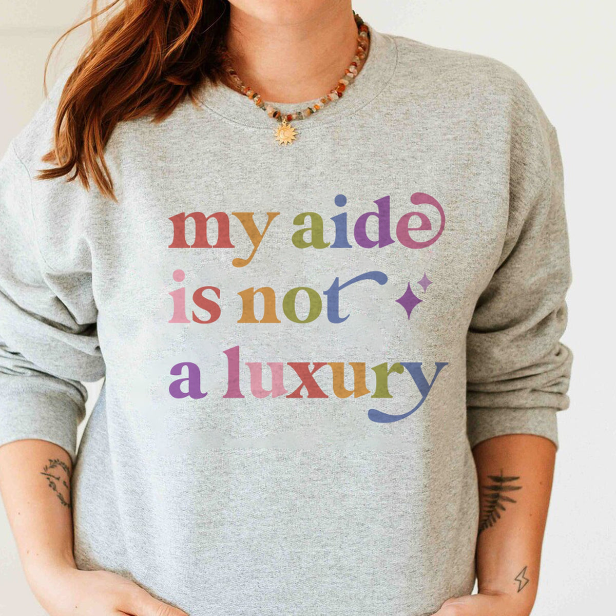 My Aide is not a Luxury Care & Resist Gildan crewneck sweatshirt in Sport Grey