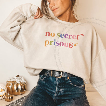 No Secret Prisons Care & Resist Gildan crewneck sweatshirt in Sand