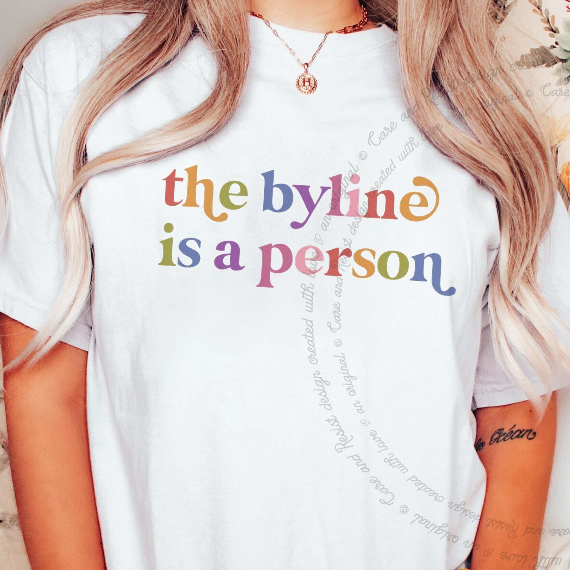 The Byline is a Person Care & Resist rainbow tee