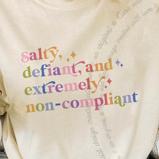 Salty, Defiant, and Extremely Non-compliant Care & Resist progressive t-shirt in Ivory