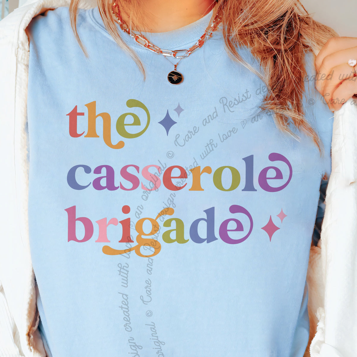 The Casserole Brigade Care & Resist progressive t-shirt in Chambray