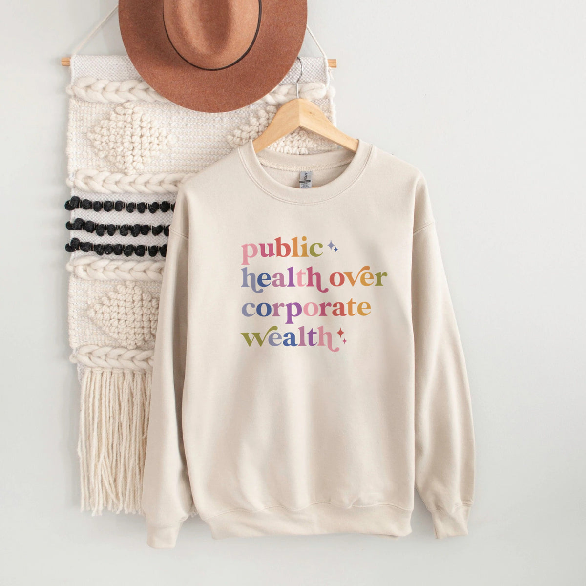 Public Health Over Corporate Wealth Care & Resist Gildan crewneck sweatshirt in Sand