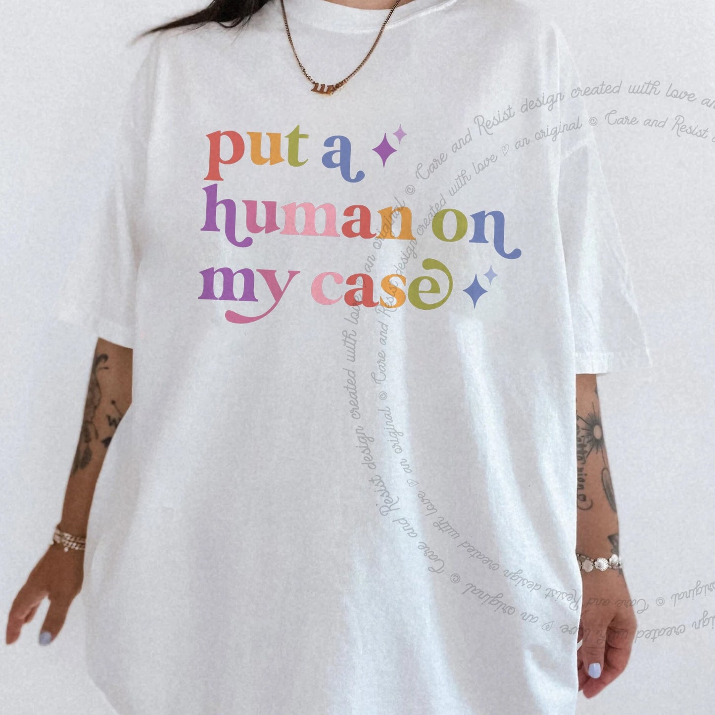 Put a Human on My Case Care & Resist rainbow Comfort Colors tee, White