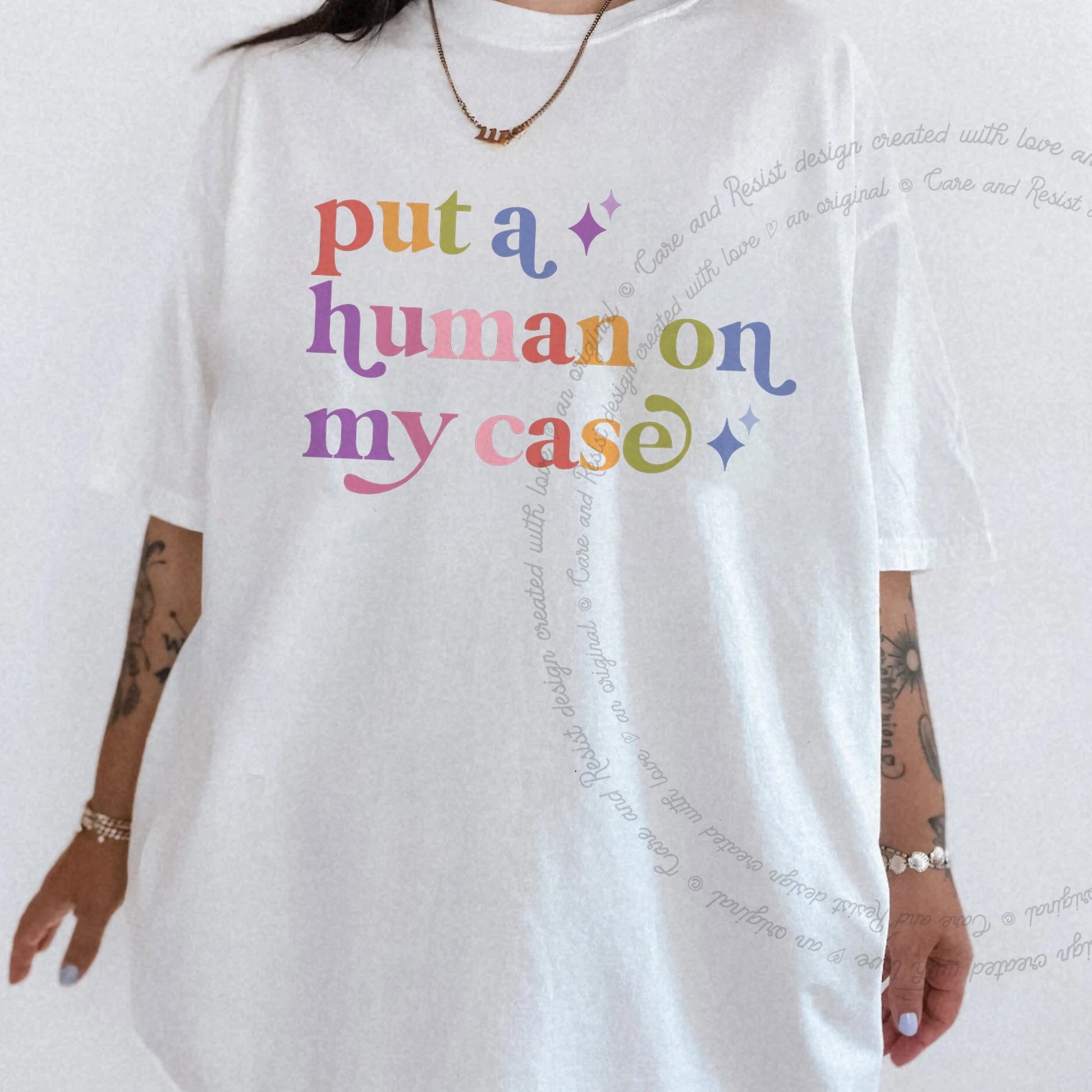 Put a Human on My Case Care & Resist rainbow Comfort Colors tee, White
