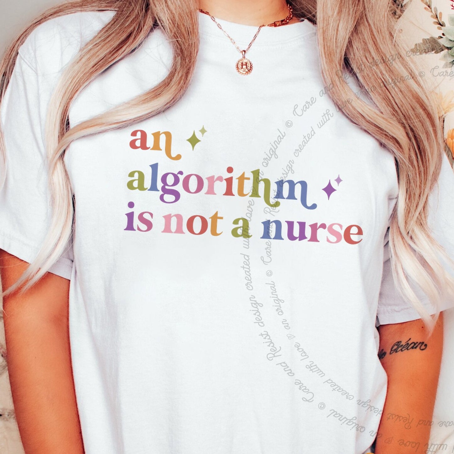 An Algorithm is not a Nurse Care & Resist rainbow tee