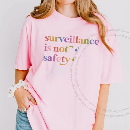 Surveillance is not Safety Care & Resist rainbow Comfort Colors tee, Blossom