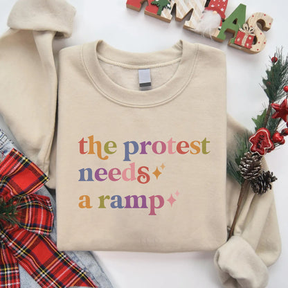 The Protest Needs a Ramp Care & Resist Gildan crewneck sweatshirt in Sand